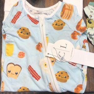 Two never worn Caden Lade footie Jammies super cute and comfy